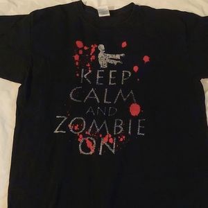 A large black T-shirt with a Zombie design from Gildan